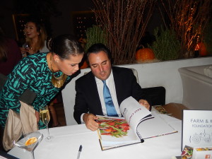 Laurent Halasz signs his cookbook